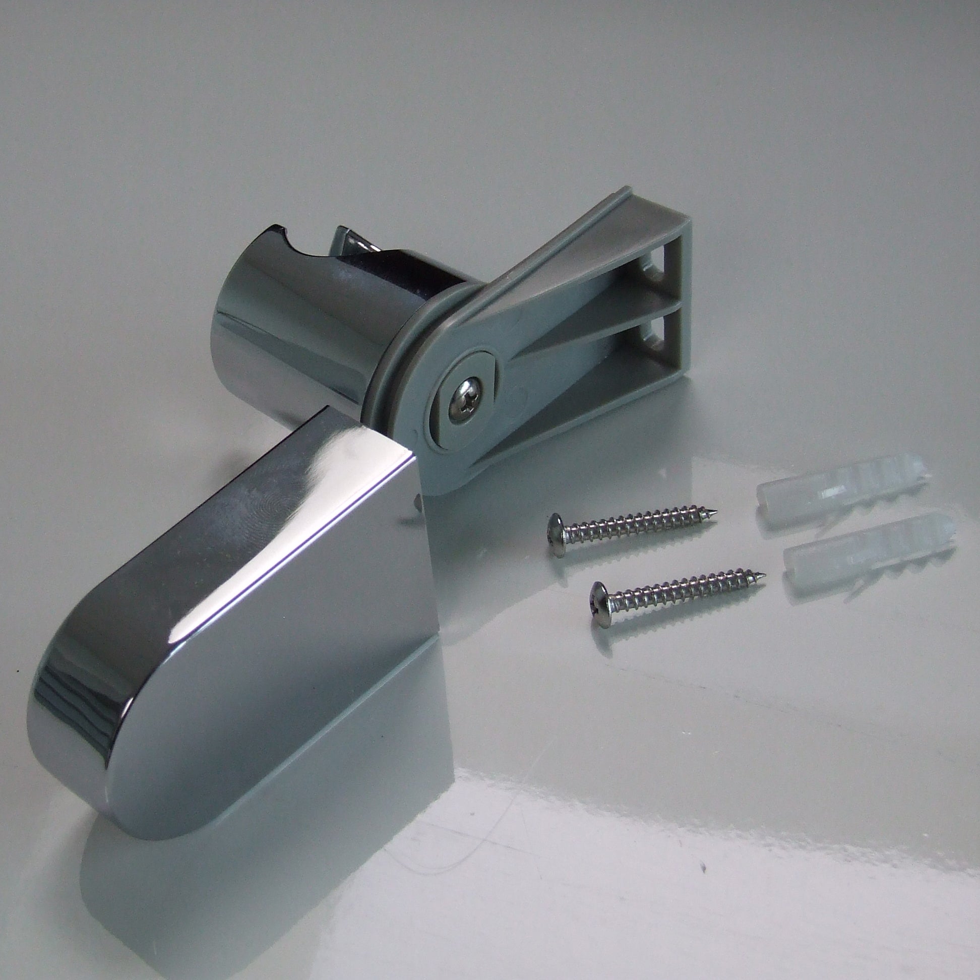 Nástěnný držák pro ruční sprchové hlavice